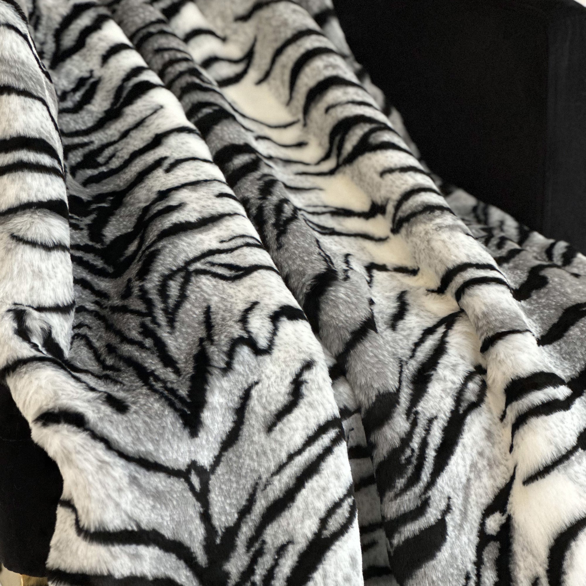 Black & White Zebra Faux Fur Throw Blanket: Indulge in Ethical Elegance and Unmatched Softness